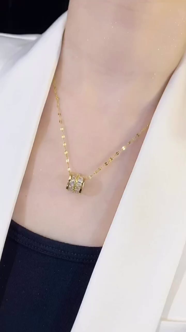 Luxurious Gold-Plated Barrel Pendant Necklace with Intricate Baguette and Round-Cut Cubic Zirconia Crystals on a Dainty Designer Chain – Elegant Jewelry for Formal, Office, or Daily Wear