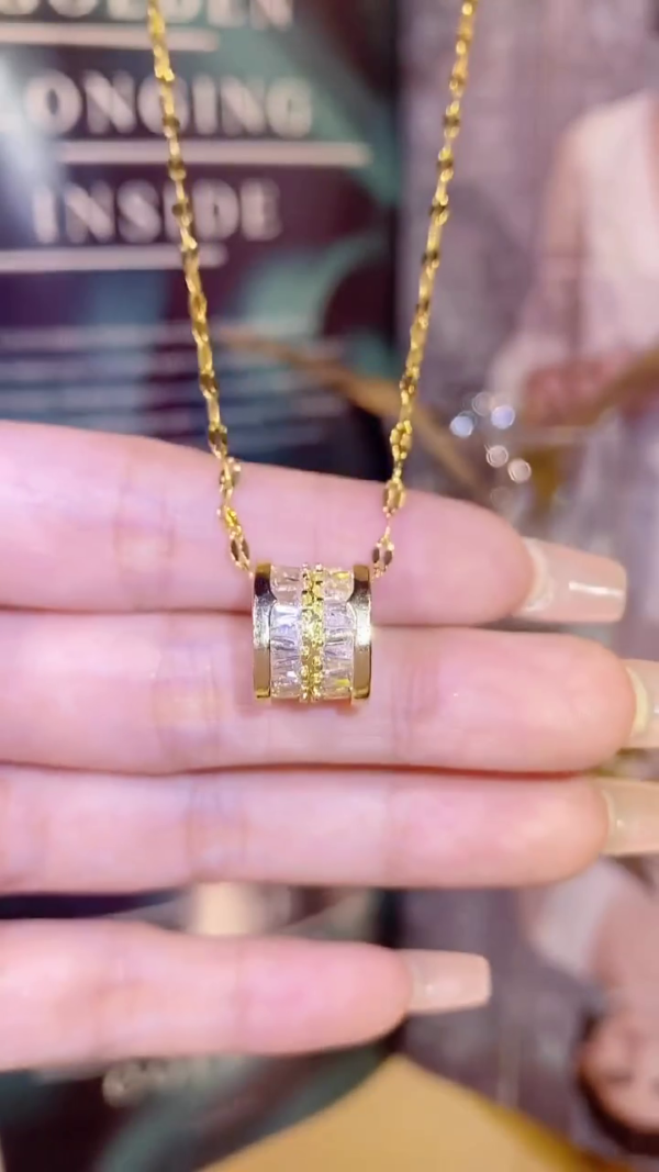 Luxurious Gold-Plated Barrel Pendant Necklace with Intricate Baguette and Round-Cut Cubic Zirconia Crystals on a Dainty Designer Chain – Elegant Jewelry for Formal, Office, or Daily Wear - Image 2