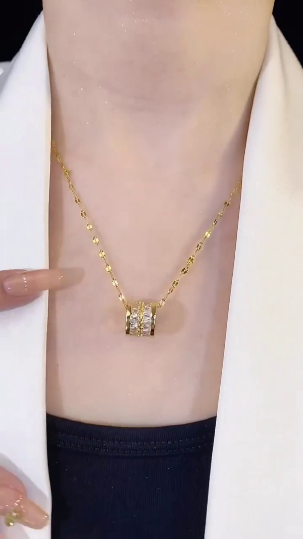 Luxurious Gold-Plated Barrel Pendant Necklace with Intricate Baguette and Round-Cut Cubic Zirconia Crystals on a Dainty Designer Chain – Elegant Jewelry for Formal, Office, or Daily Wear - Image 3