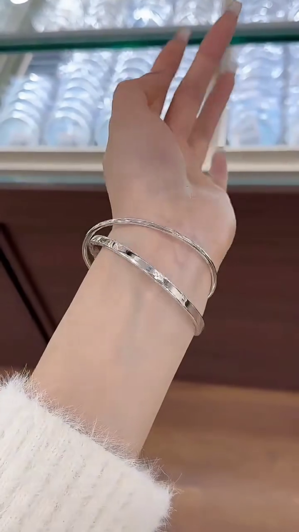 Exquisite High-Polish Interlocking Sterling Silver Bangles with Intricate Textured Detailing – Timeless Elegant Jewelry for Women - Image 3