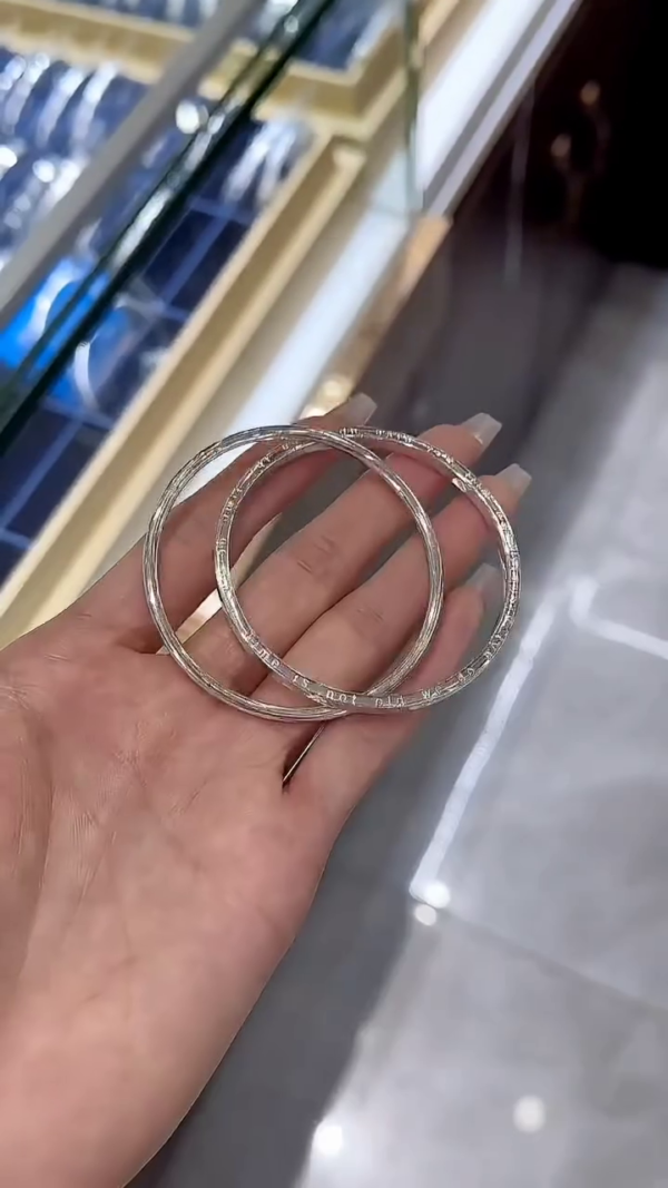 Exquisite High-Polish Interlocking Sterling Silver Bangles with Intricate Textured Detailing – Timeless Elegant Jewelry for Women - Image 2