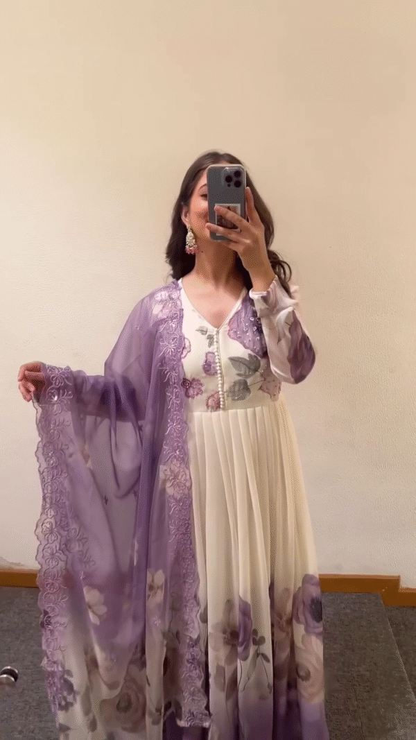 Off-White and Lavender Floral Printed Anarkali Suit Set for Women Featuring Pearl Button Detailing, Full Sleeves, and a Soft Net Dupatta with Lace Border – Perfect for Festive Celebrations, Parties, and Ethnic Occasions