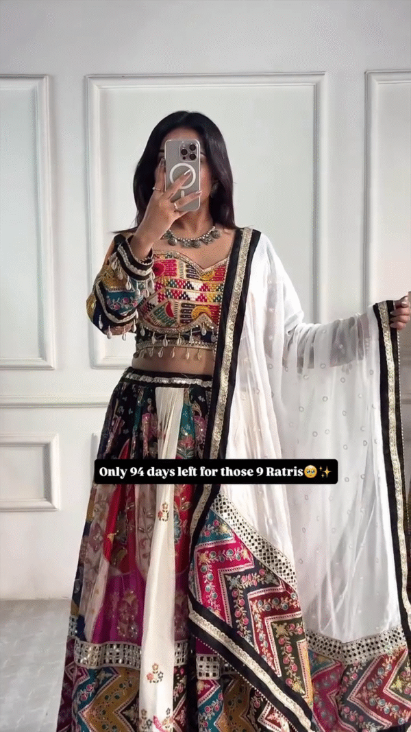 Colorful Traditional Navratri Ghagra Choli Set for Women Featuring Multicolor Embroidered Blouse, Mirror Work Flared Skirt, and Elegant White Dupatta with Sequin Detailing – Perfect for Dandiya, Garba, and Festive Celebrations