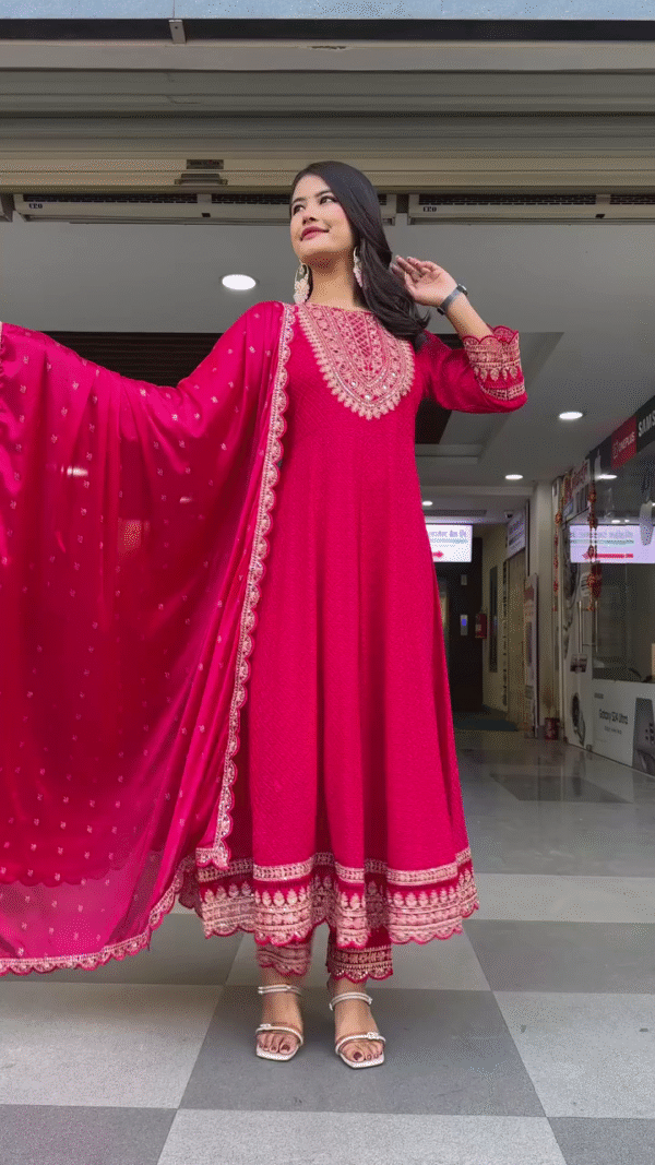 Traditional Rani Pink Anarkali Suit Set with Intricate Golden Embroidery on Neckline and Hem, Paired with Matching Embellished Dupatta and Straight Pants – Ideal for Weddings, Festive Celebrations, and Special Occasions