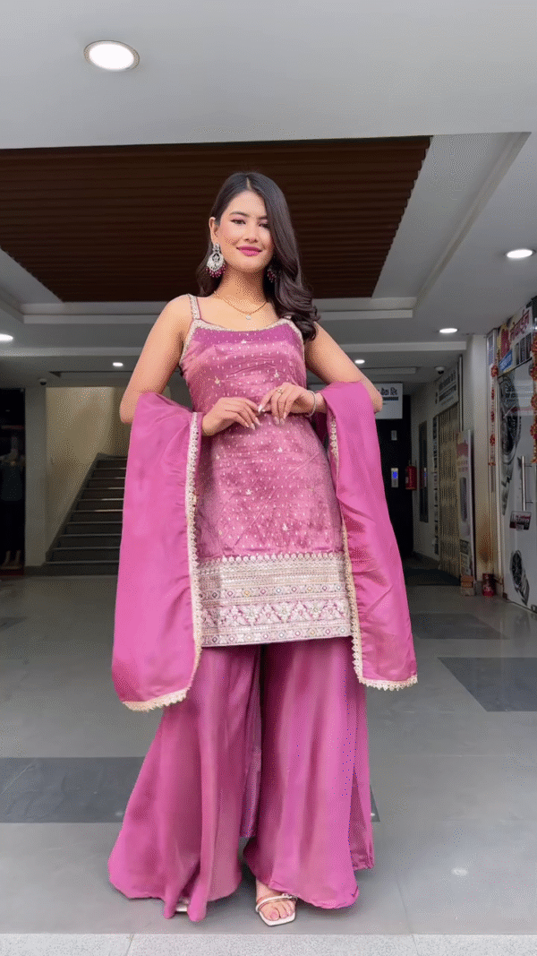 Stylish Party Wear Mauve Pink Sharara Suit Set Featuring Sleeveless Embellished Kurti with Delicate Mirror and Thread Work, Flowy Flared Sharara Pants, and Matching Dupatta – Perfect Ethnic Ensemble for Festive Celebrations and Evening Event