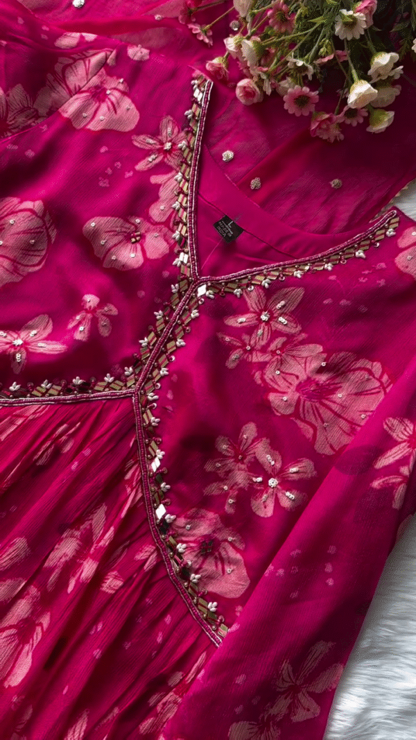 Deep Pink Floral Printed Georgette Suit Set with Hand-Embellished Mirror Work Neckline, Soft Matching Dupatta with Sequin Detailing, and Coordinated Elasticated Bottoms – Perfect for Festive and Special Occasions - Image 3