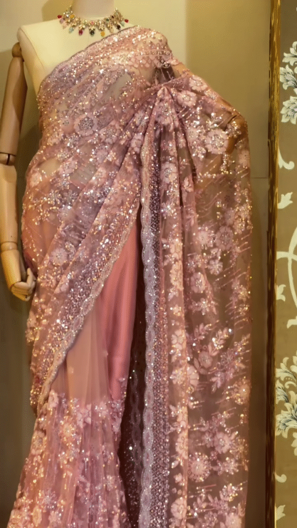 Designer Dusty Rose Pink Net Saree with Heavy Sequin and Floral Embroidery Work, Paired with a Matching Satin Underskirt and Complementary Festive Choker Necklace – Ideal for Weddings, Receptions, and Special Occasions