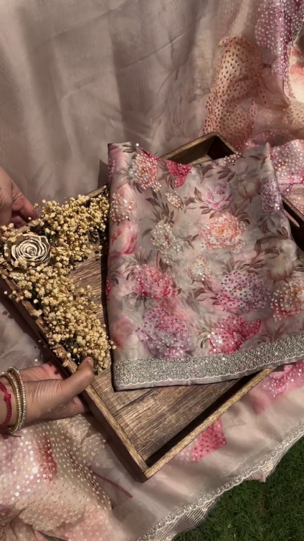 Soft Organza Saree in Subtle Pastel Shades Featuring All-Over Floral Digital Print and Intricate Sequins Embroidery with Designer Silver Zari Border – Perfect for Festive and Wedding Occasions
