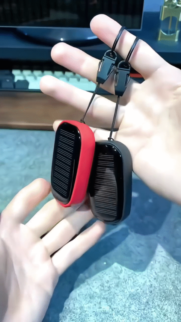 Solar-Powered Mini Fast Charger with Compact Design, Dual Color Options, Wireless Charging Pad, and Keychain Strap for Easy Portability and Universal Smartphone Compatibility - Image 3