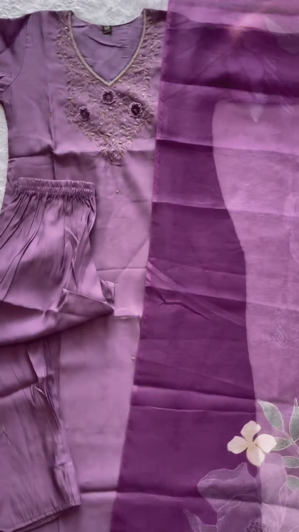 Elegant Lavender Satin Kurta Set – V-Neck with Detailed Floral Thread Embroidery and Sequins, Paired with Matching Elastic-Waist Trousers and a Sheer Purple Floral-Printed Dupatta – Perfect for Graceful Festive or Semi-Formal Wear - Image 2