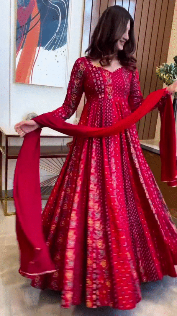 Red Bandhani Print Flared Anarkali Kurta Set with Dupatta and Matching Potli Bag Featuring Full Sleeves Sweetheart Neckline Traditional Ethnic Wear for Festive and Special Occasions