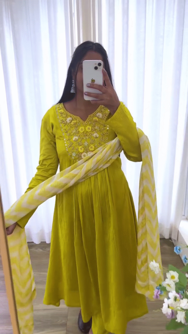 Vibrant Yellow Cotton Anarkali Kurta Set with Intricate Floral Embroidery and Mirror Work on the Neckline, Paired with Matching Bottoms and Chevron Printed Dupatta – Perfect for Haldi, Daytime Festivities, and Traditional Celebrations - Image 2