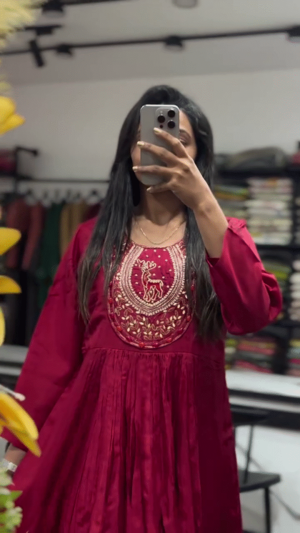 Elegant Red Embroidered Long Dress with Detailed Neckline and Flowing Silhouette - Image 2
