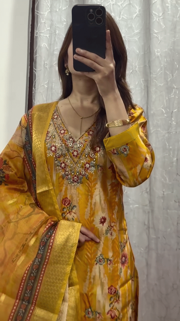 Vibrant Yellow Floral Embroidered Kurta with Intricate Beaded Detailing, Paired with a Sheer Dupatta for a Festive and Elegant Look