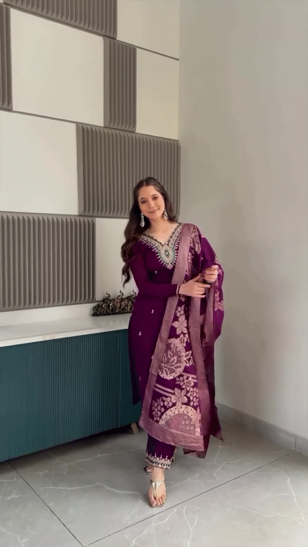 Purple Anarkali Outfit with Intricate Embroidery, Paired with a Beautifully Detailed Dupatta, Complemented by Simple Accessories for a Graceful Traditional Look