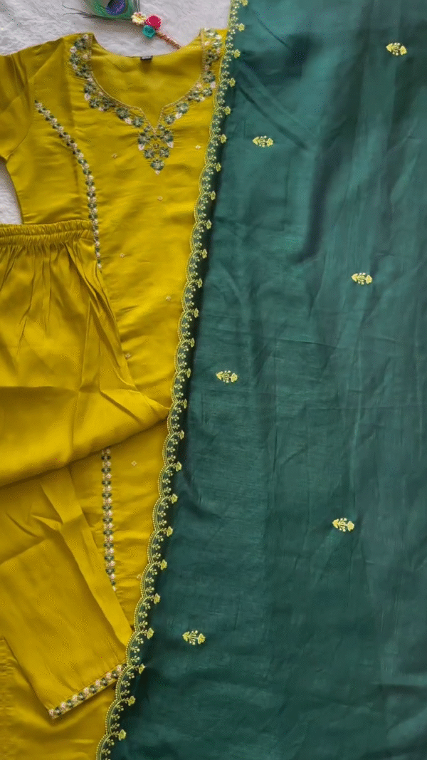 Vibrant Mustard Straight-Cut Kurta Set with Delicate Mirror Work and Floral Embroidery – Paired with a Contrasting Deep Green Dupatta Featuring Intricate Scalloped Lace Border – A Bold Yet Elegant Pick for Festive and Casual Occasions. - Image 2