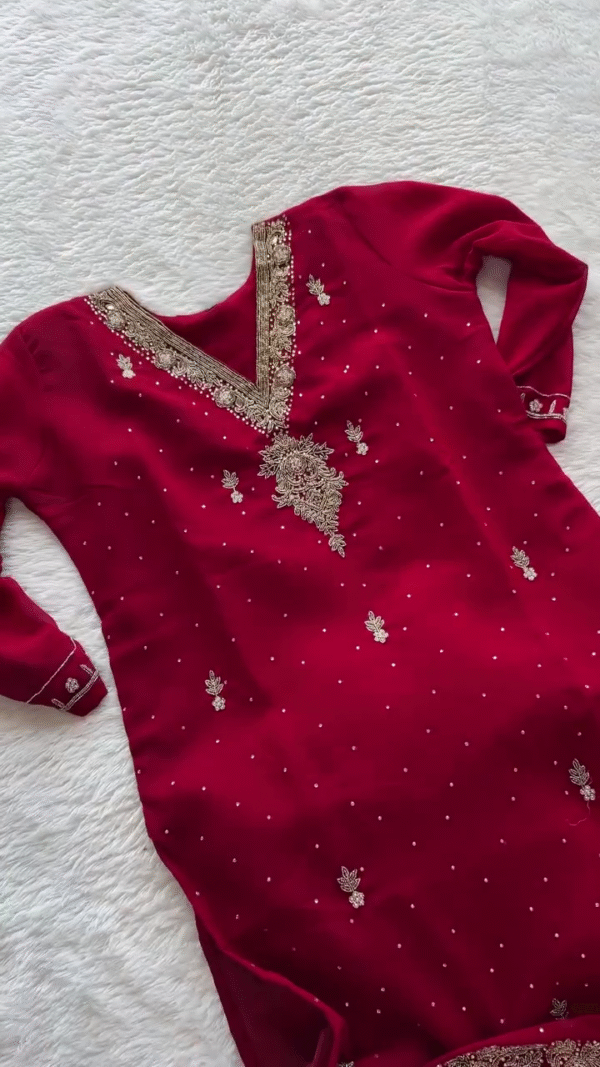 Rich Red Embroidered Anarkali Set with Intricate Gold Detailing and Pearl Accents for Festive Elegance