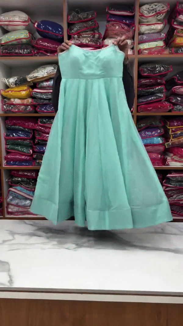 Elegant and Sparkling Teal Dress for Special Occasions - Image 2