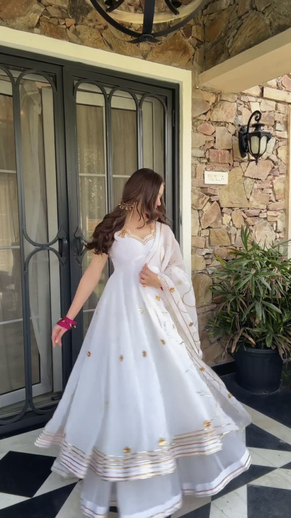 White Anarkali Dress with Gold Embroidery and Sheer Dupatta for a Graceful Traditional Look
