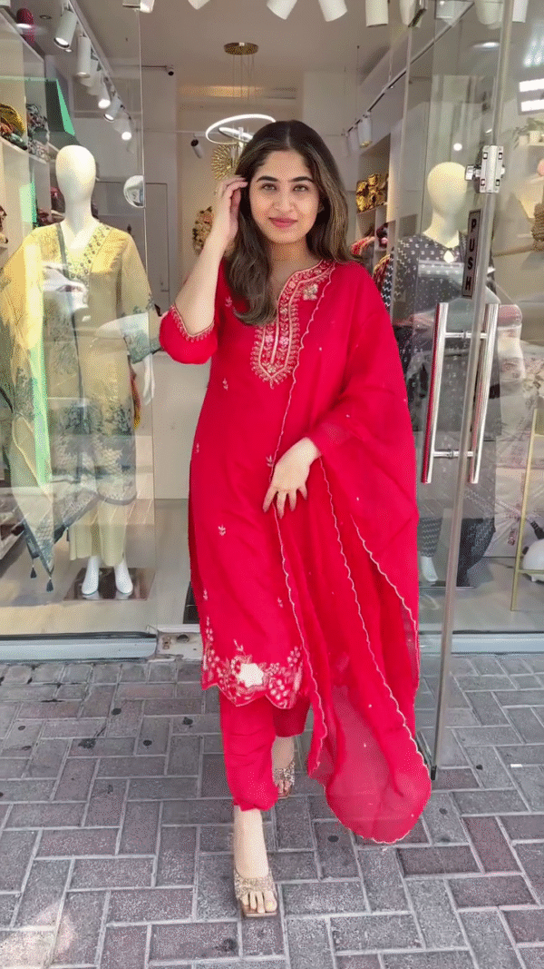 Vibrant Red Straight-Cut Suit with Intricate Thread and Sequin Embroidery on Neckline and Hem – Paired with Delicately Embellished Dupatta and Tapered Pants – A Timeless Choice for Festive Occasions and Traditional Events - Image 2