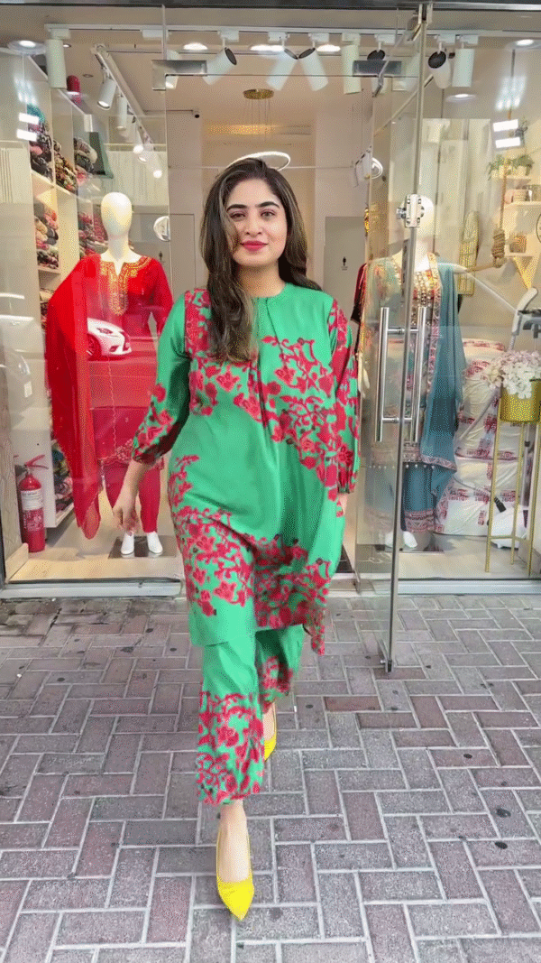 Bold Green Co-ord Set with Striking Red Floral Prints – Featuring a Flowy Long Kurta and Coordinated Trousers – A Contemporary Fusion Look for Casual Outings and Daytime Celebrations