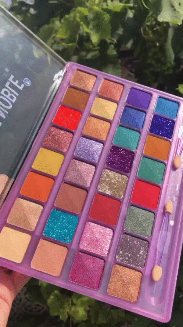 Colorful and Sparkling Eyeshadow Palette with a Wide Range of Shimmer, Matte, and Glitter Shades in Bold and Vibrant Tones for Creative Eye Looks