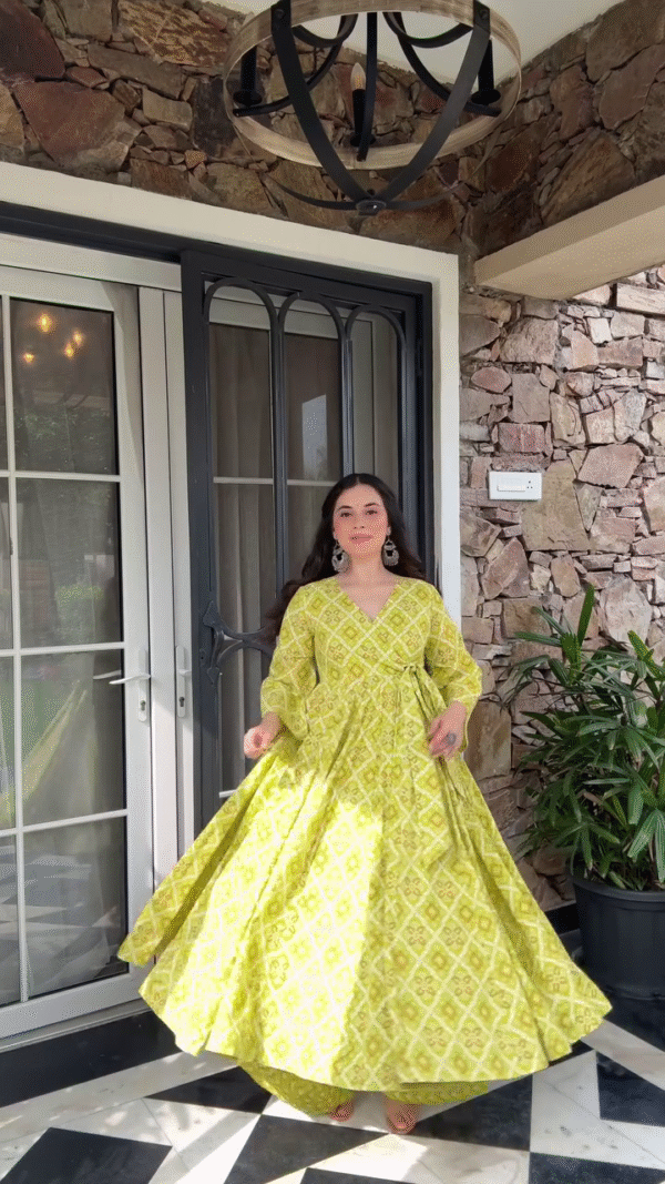 Vibrant Yellow Floral Print Anarkali Dress with Bell Sleeves and Flowing Skirt for a Traditional Look