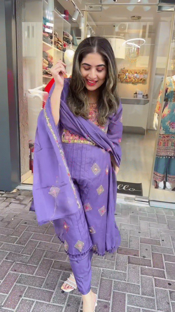 Elegant Purple Suit Set with Intricate Multicolor Thread Embroidery and Geometric Motifs – Featuring a Straight-Cut Kurta, Tapered Pants, and a Coordinated Embroidered Dupatta – Perfect for Festive Days and Ethnic Gatherings