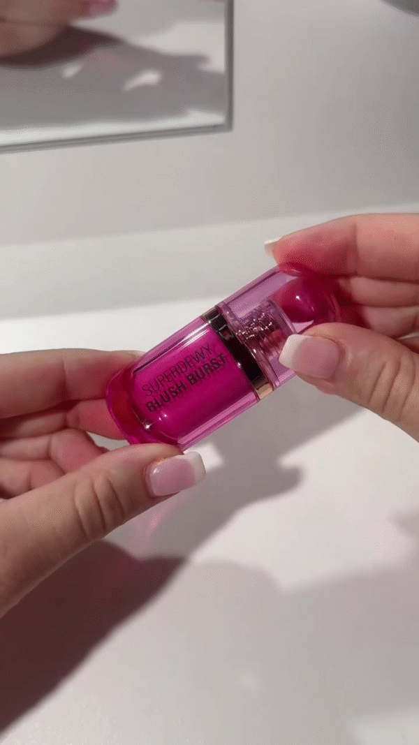 Vibrant Dewy Pink Lip Gloss - Glossy Finish with a Burst of Bold Color