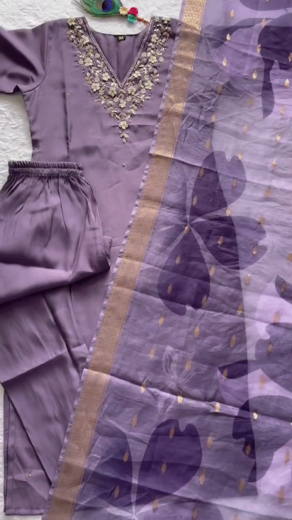 Elegant Lavender Suit Set adorned with delicate floral embroidery on the neckline paired with a soft net dupatta featuring bold butterfly prints and golden accents. - Image 2