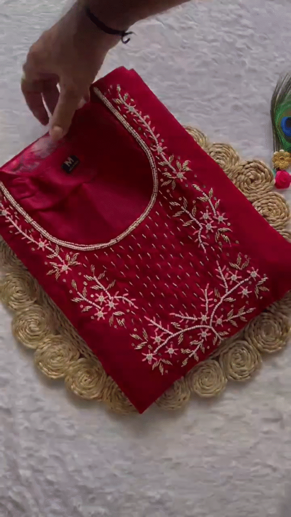 Elegant Crimson Red Suit Set featuring delicate white thread embroidery on the yoke, paired with a sheer dupatta adorned with subtle floral prints and golden motifs for a festive yet refined look.