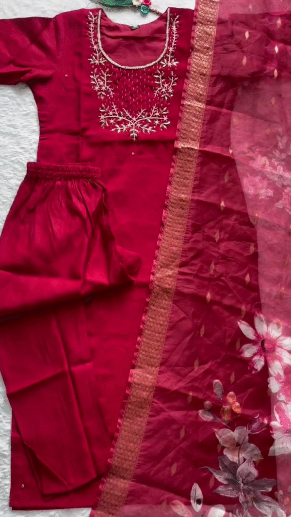 Elegant Crimson Red Suit Set featuring delicate white thread embroidery on the yoke, paired with a sheer dupatta adorned with subtle floral prints and golden motifs for a festive yet refined look. - Image 2