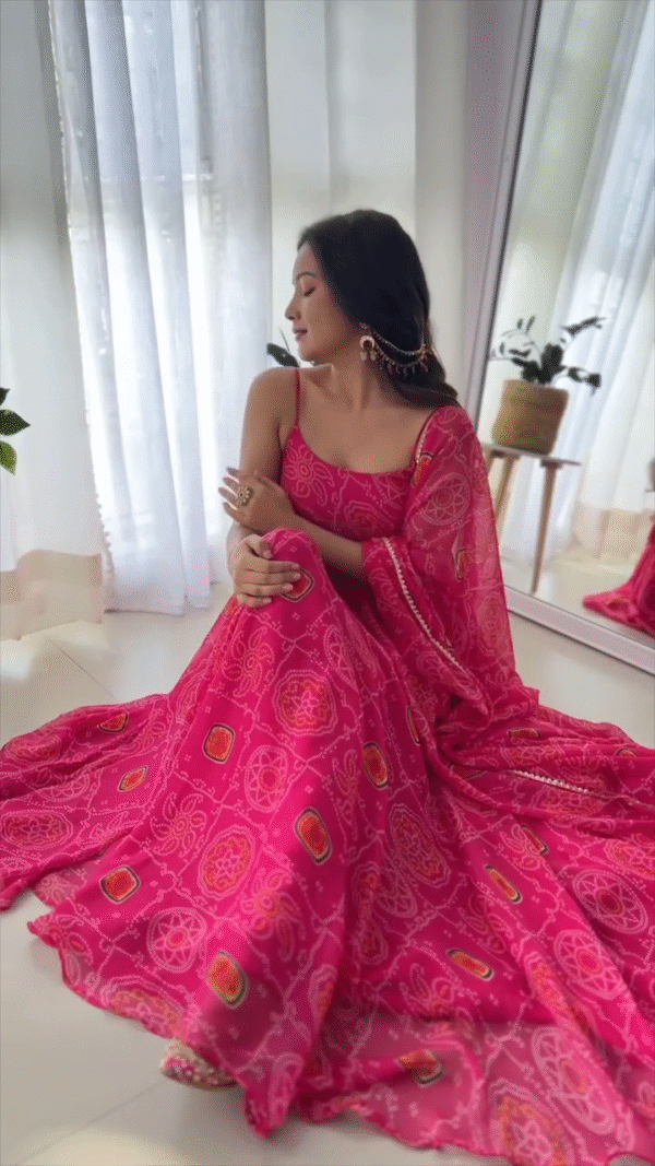 Vibrant Pink Bandhani Print Flared Anarkali Gown with Matching Dupatta – Sleeveless Festive Ethnic Wear Ideal for Navratri, Weddings, and Traditional Celebrations