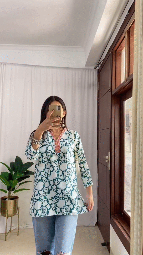 Printed Kurti Tops — Featuring Teal Floral V-Neck Design with Pink Embroidered Neckline for a Fresh Ethnic Twist, and Cream Kurti with Multicolor Leaf Prints and Lace Detailing