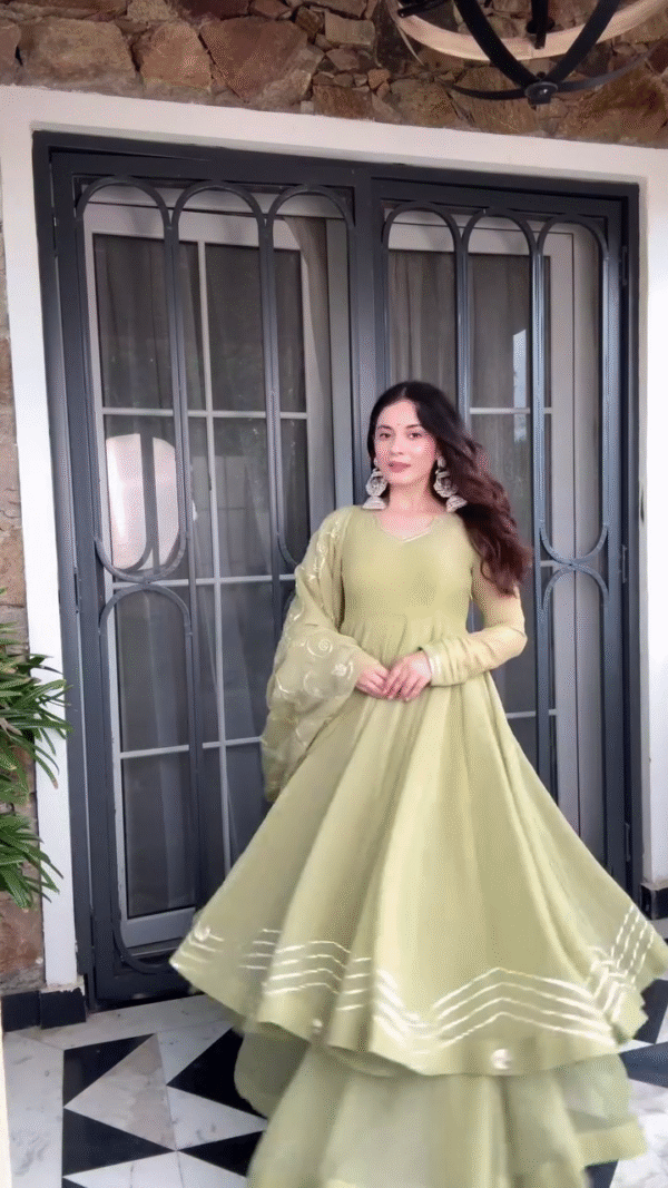 Sage Green Anarkali Dress with Sheer Embroidered Sleeves, Beautiful Pleated Skirt, and Intricate Detailing, Perfect for Festive and Formal Occasions - Image 2