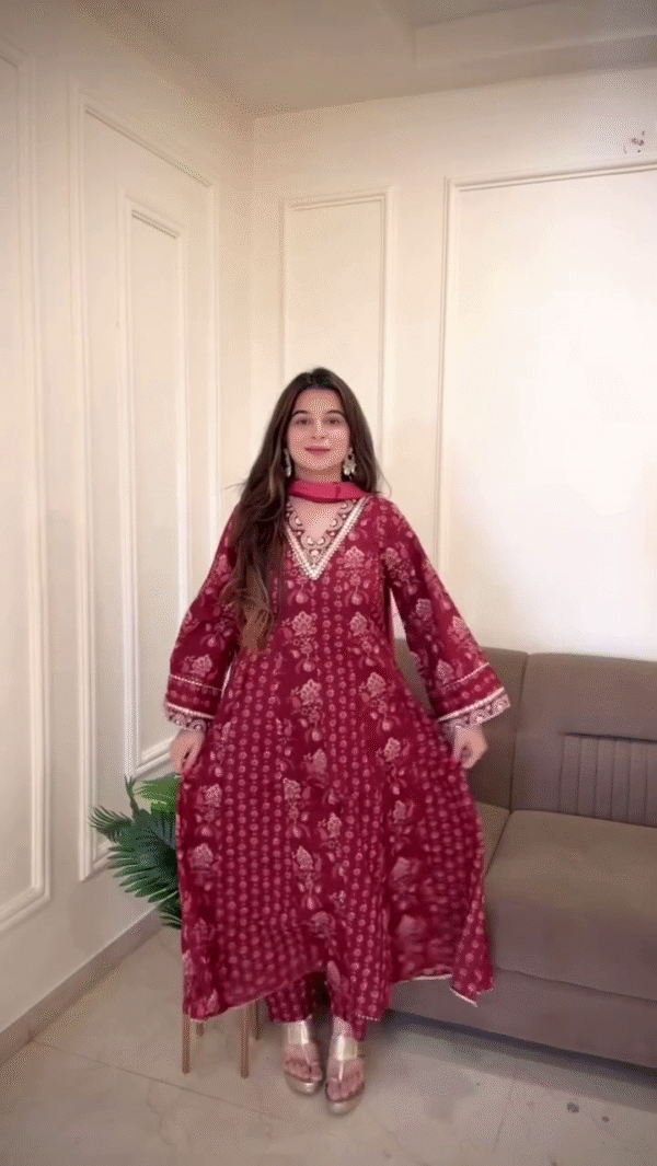 Charming Red Printed Kurta with Intricate Gold Detailing, Flared Sleeves, and Matching Dupatta – A Perfect Blend of Traditional Elegance and Comfort