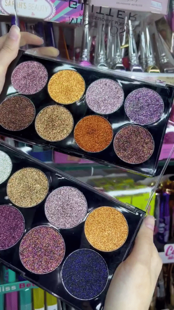 12-Color Glitter Eyeshadow Palette – Vibrant Metallic and Shimmer Shades in Gold, Purple, Copper, Silver, Pink, and Blue for Glamorous Party and Festive Eye Makeup Looks