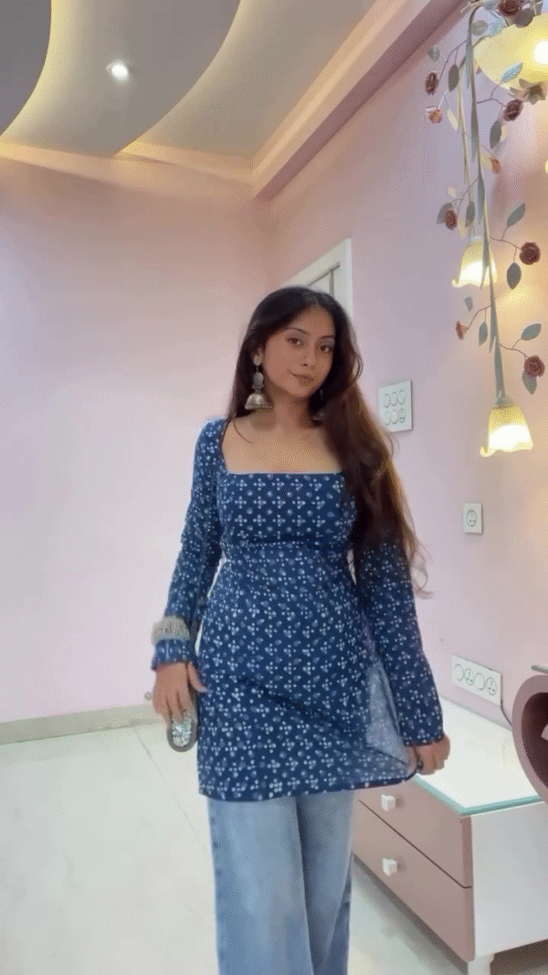 Chic Blue Printed Kurti with Square Neckline and Flared Sleeves Paired with Light Blue Wide-Leg Jeans – A Perfect Fusion of Ethnic Elegance and Contemporary Style for Casual Outings and Everyday Wear