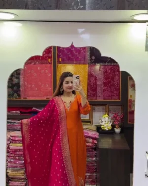 Rust Orange Embroidered Kurta Set with Contrast Rani Pink Dupatta, Intricate Neckline Detailing & Matching Straight Pants – Festive Ethnic Wear for Weddings, Celebrations & Special Occasions